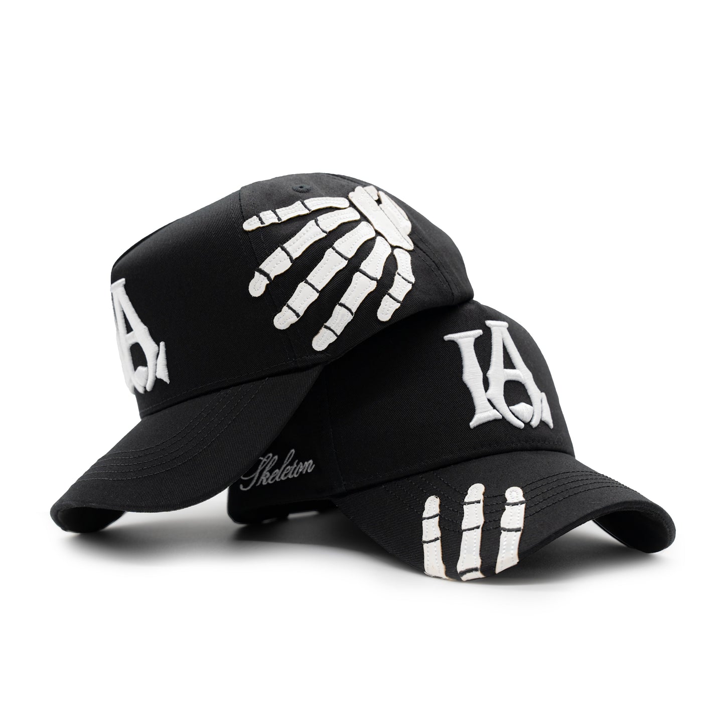 Two LA Skeleton Hats together
