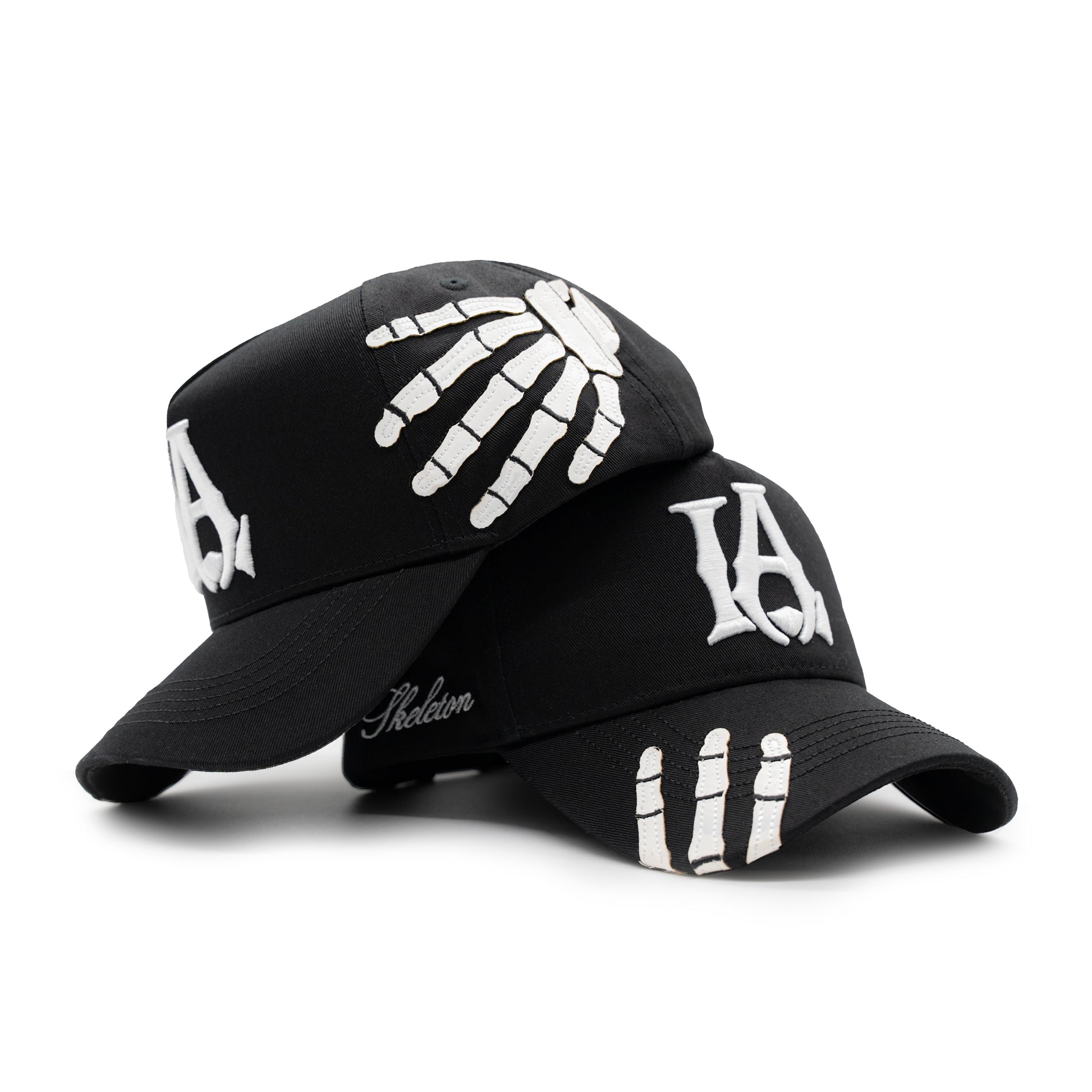Two LA Skeleton Hats together
