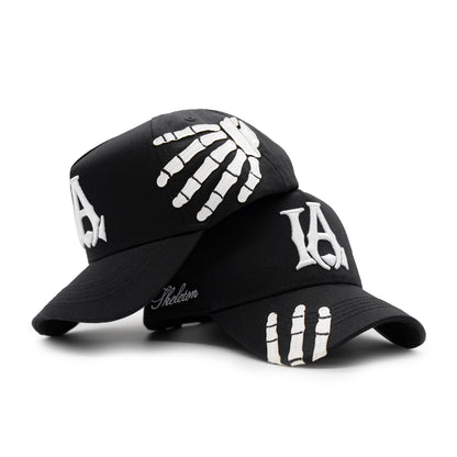 Two LA Skeleton Hats together