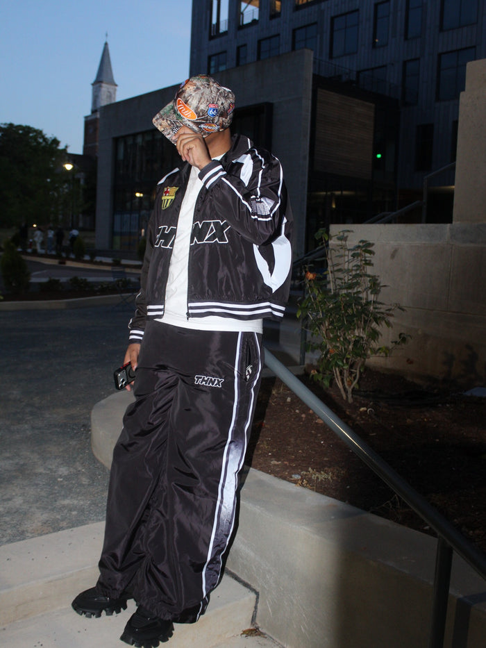 da.ronnn wearing Speedway hat