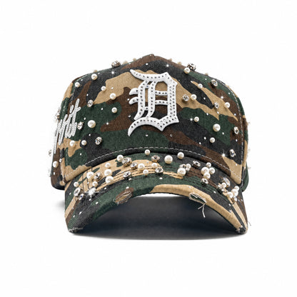 Front view of the Detroit Militia Hat with woodland camo, an Old English D, rhinestones and pearl embellishments