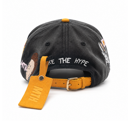 Rear view of MAKE THE HYPE TV with yellow suede strap, gold metal buckle and custom suede MTH tag